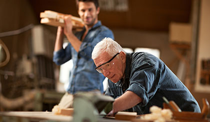 A construction business owner and his employee.